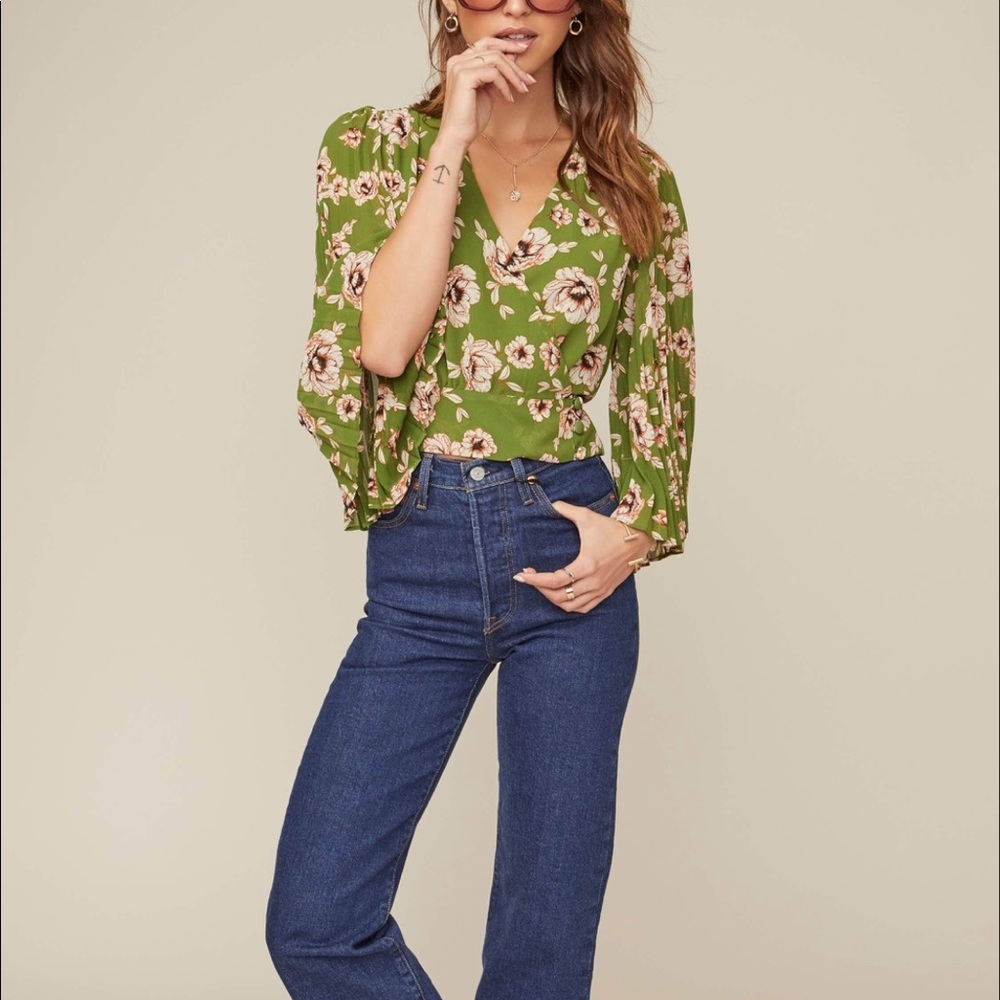 Pleated sleeve green wrap front blouse